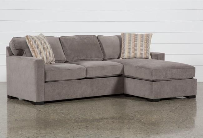 Taren II Reversible 93" Sofa/Chaise Sleeper With Storage Ottoman .