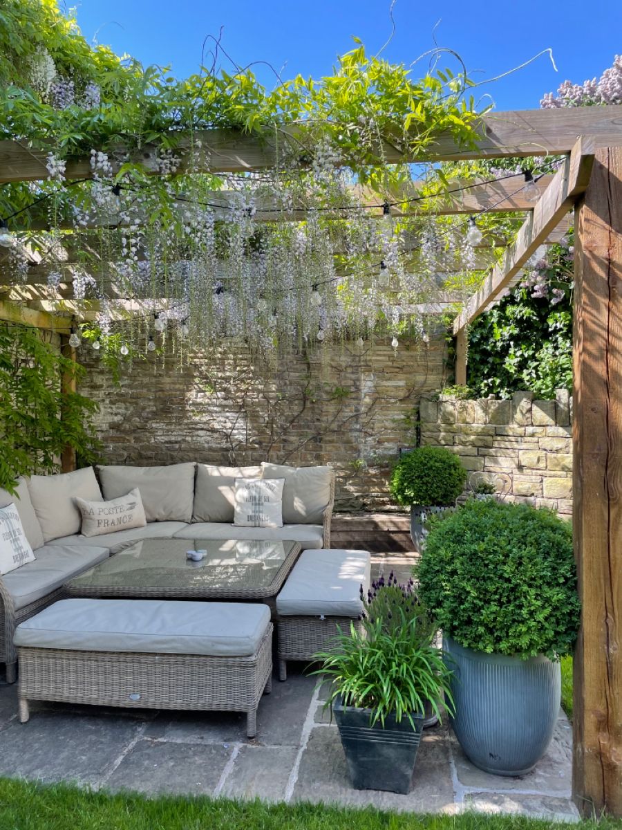 Creating a Charming Outdoor Oasis with a
  Corner Pergola