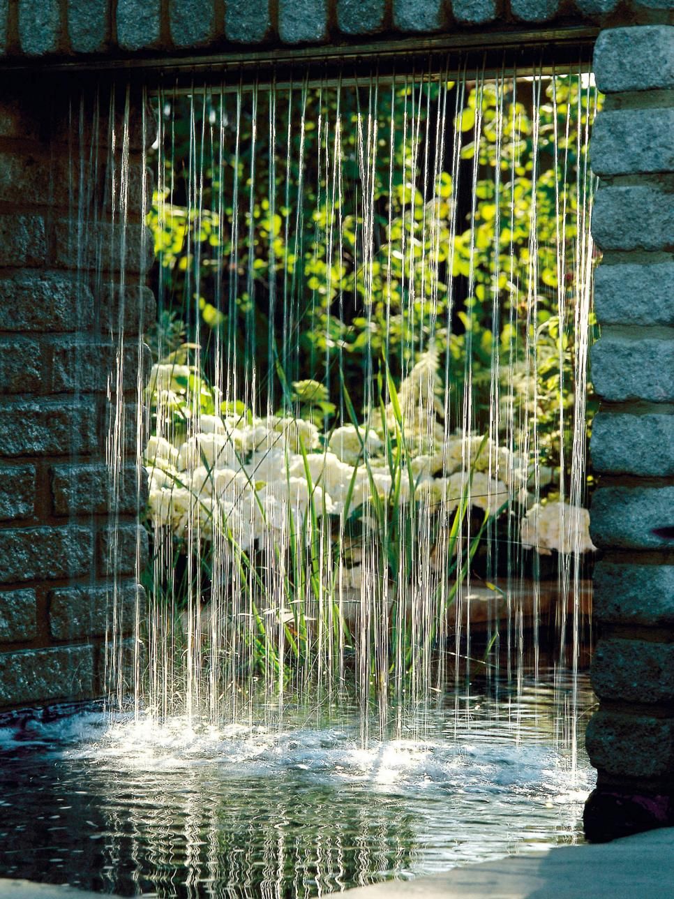 Enhance Your Outdoor Oasis with a
  Stunning Garden Waterfall