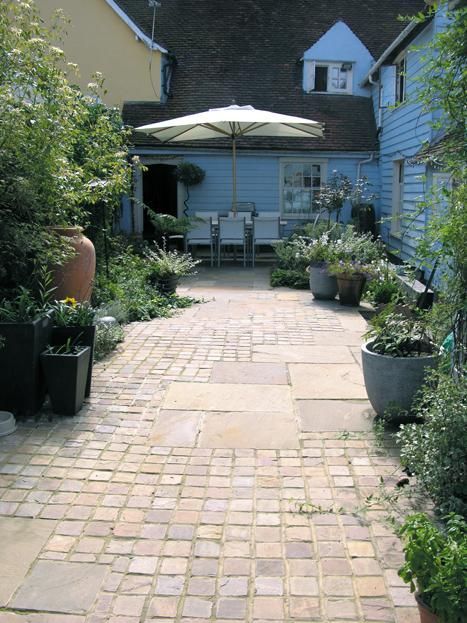 Creating a Stunning Outdoor Space with
  Sandstone Paving